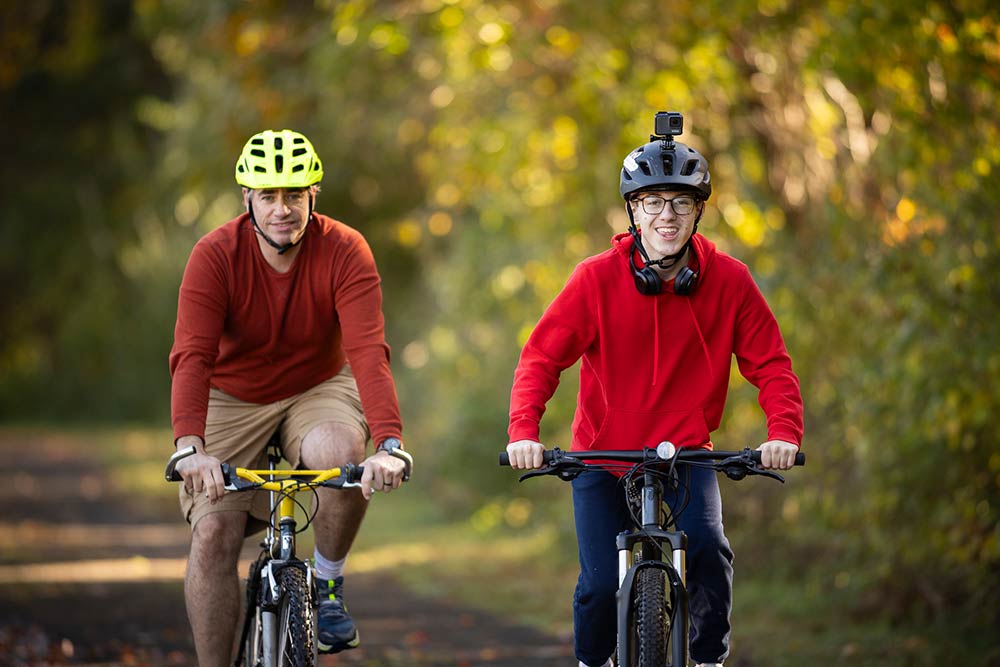 Life sports student and teacher riding bikes