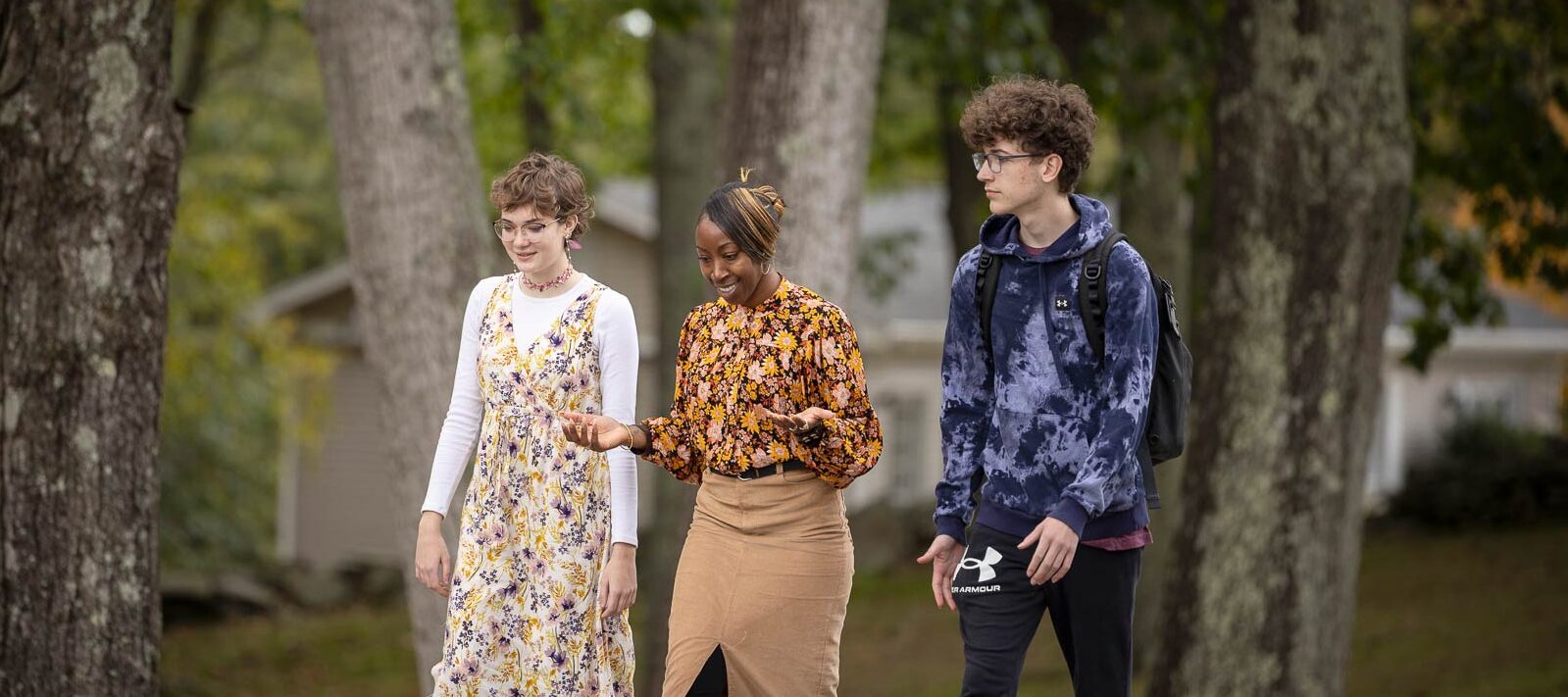 Teacher walking with students outside